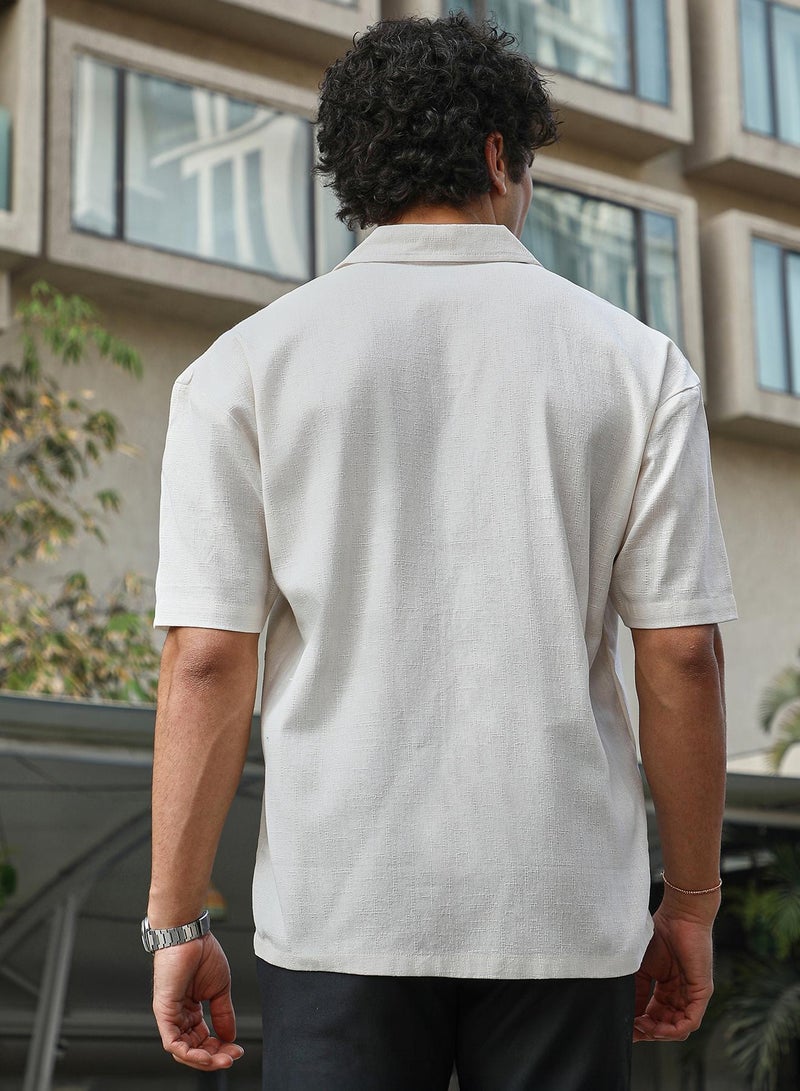 Campus Sutra Men's Ivory White Solid Resort Overised Shirt For Casual Wear | Cuban Collar | Short Regular Sleeves | Button Closure | Oversized Shirt Crafted With Comfort Fit For Everyday Wear - Image 5